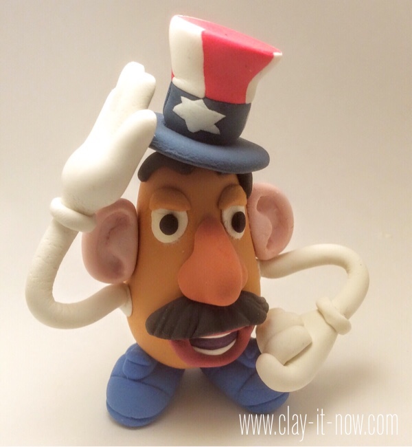 7708-patriotic potato head - mr.potato head clay figurine wearing 4th of July hat