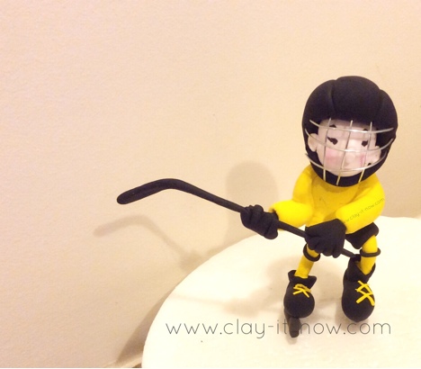 ice hockey boy figurine